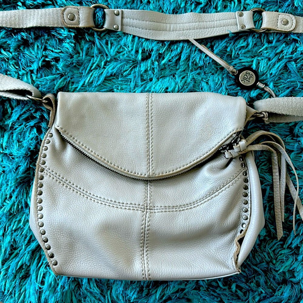 Sak gray purse with metal grommets